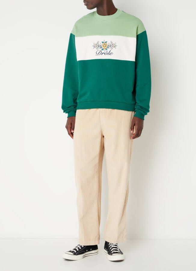 Drô, le de Monsieur Sweater met colour blocking en logoborduring