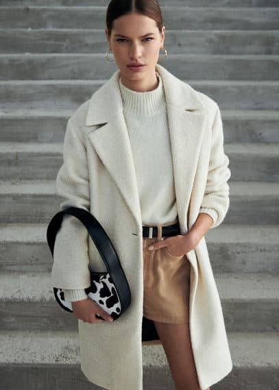 Mango Vaqui schoudertas met details van leer